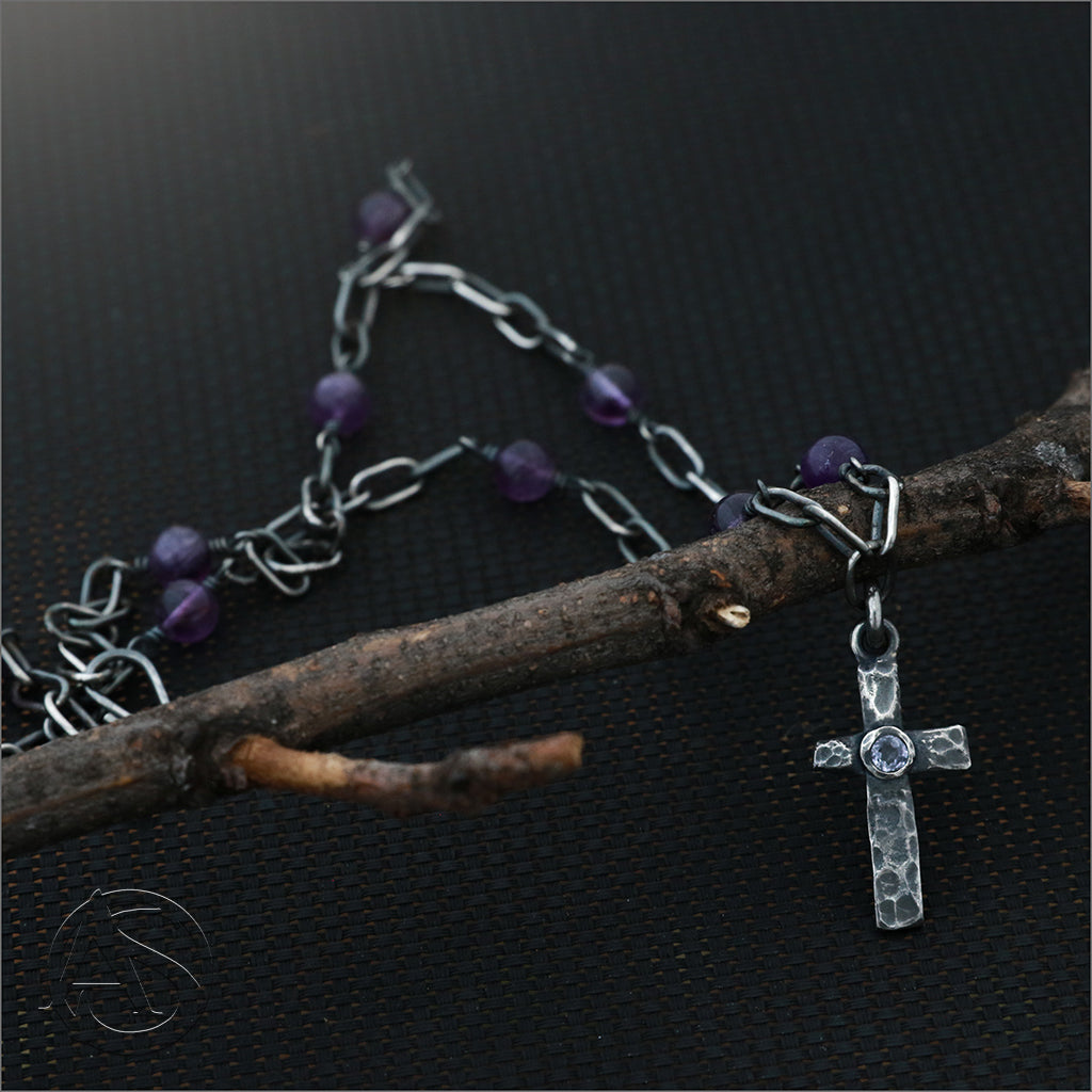 Hammered Cross with Tanzanite Centre on a Chain with Amethyst Beads