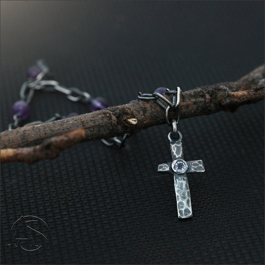 Hammered Cross with Tanzanite Centre on a Chain with Amethyst Beads